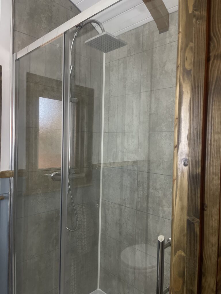 A rainfall shower in our Herdwick shepherd hut